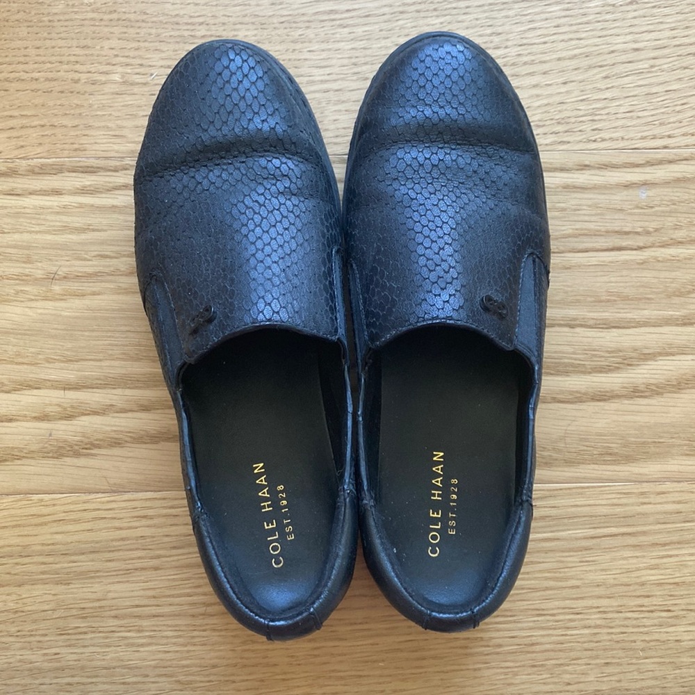 Cole Haan Black slip Ons